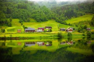 greenish village by the lake